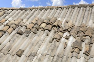 asbestos covering roof of building Abbotts Cleanup and Restoration Colorado