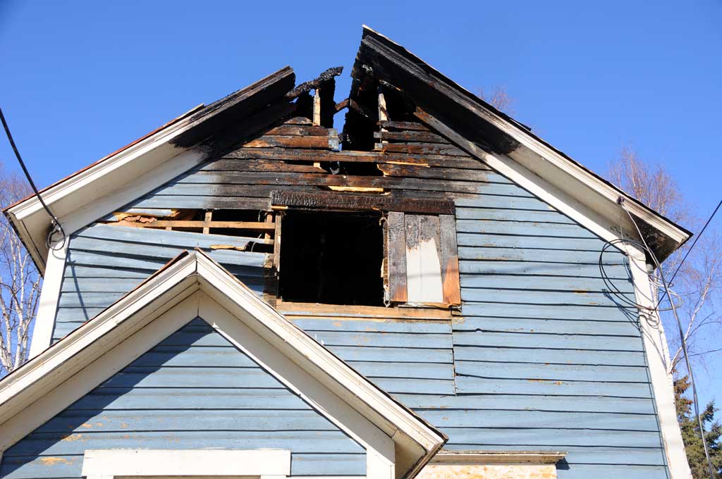 Exterior of house roof burnt Abbotts Cleanup and Restoration Colorado
