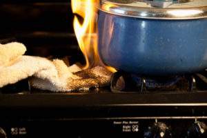Dish towel catching on fire from stove top