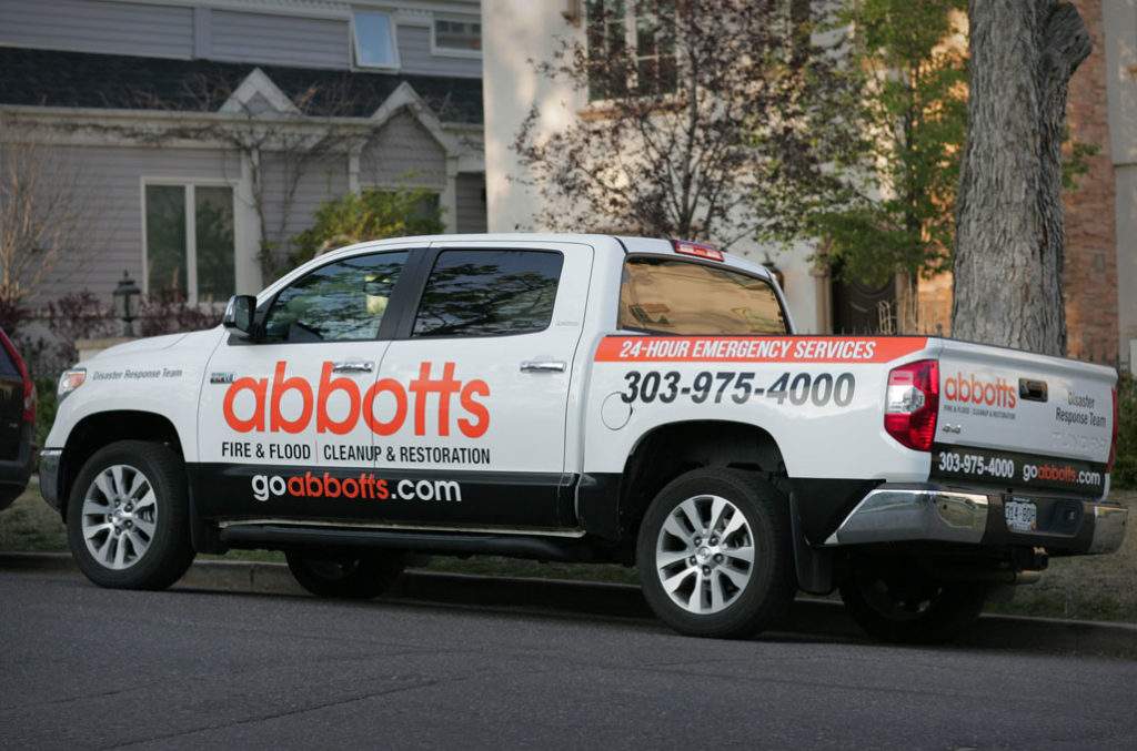 Abbotts truck in front of home