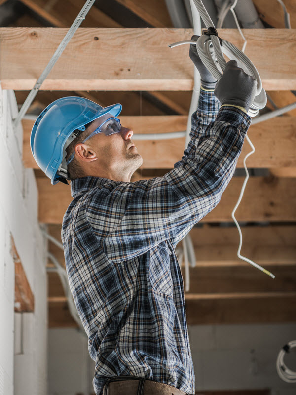 electrician replacing lighting