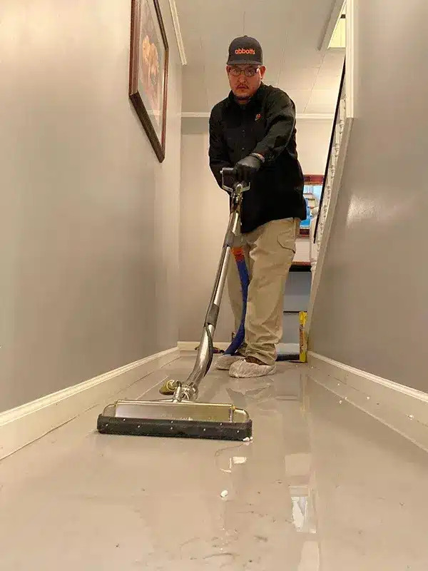 Abbotts crew performing professional water, sewage, and flood damage extraction in an Aurora, Colorado home